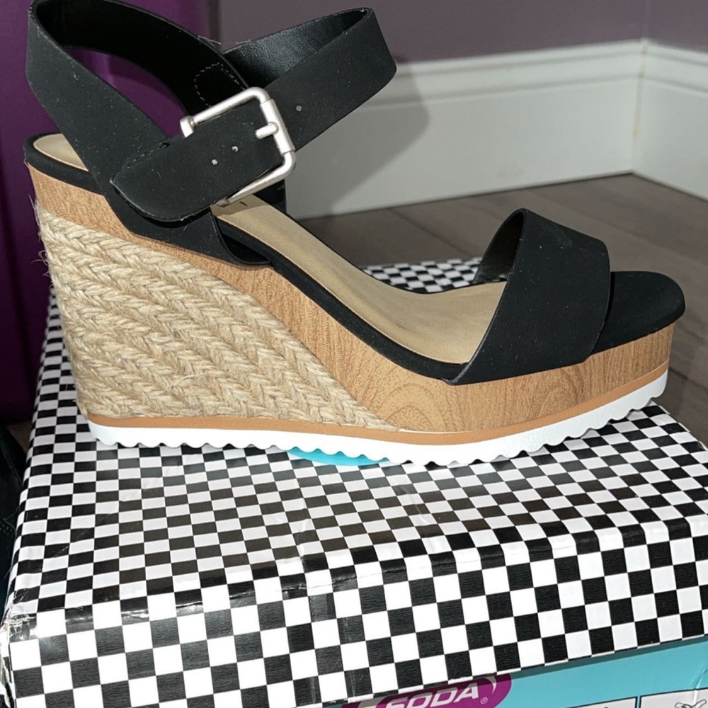 Black wedge shoe never worn